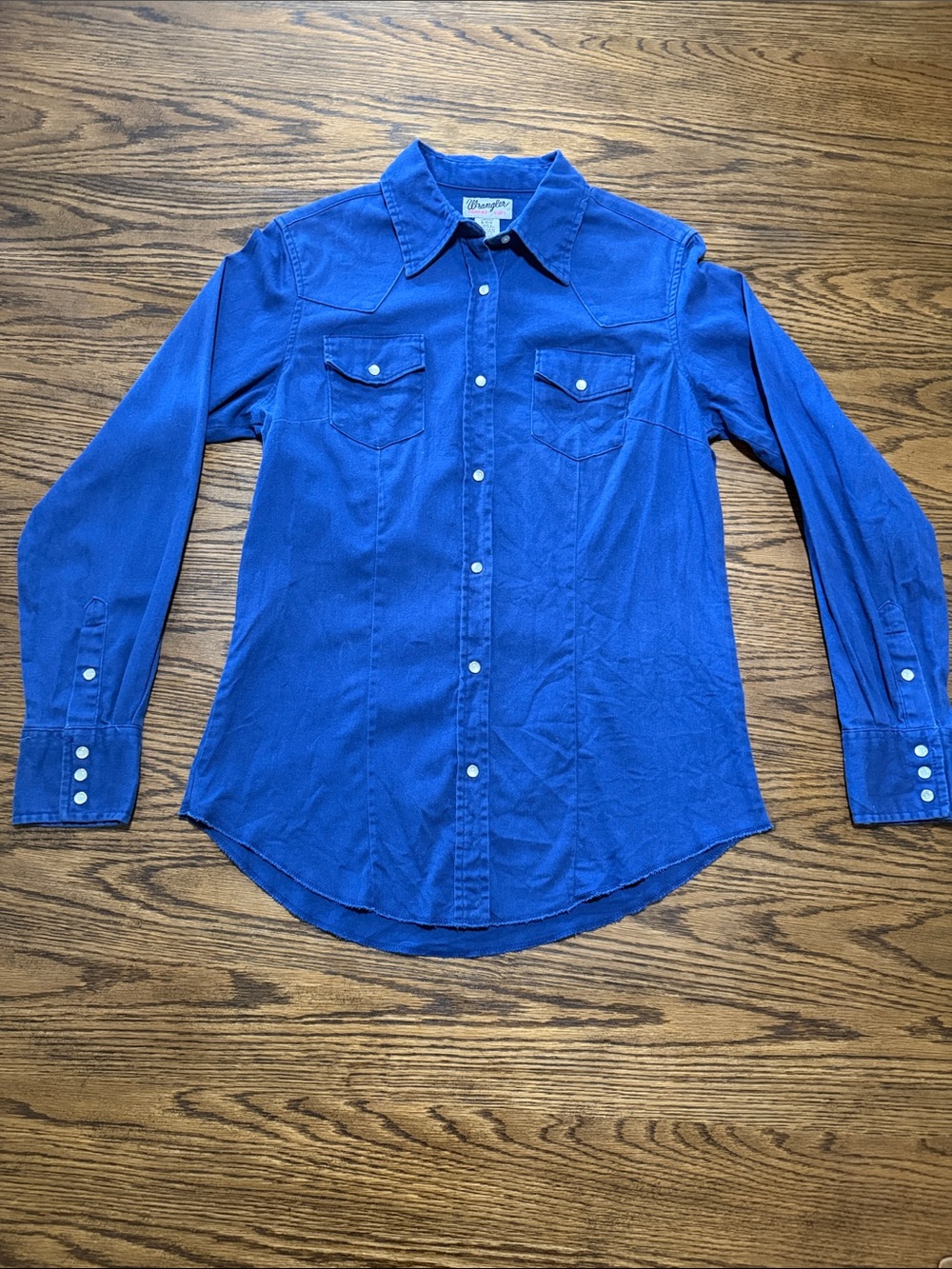 Woman’s Wrangler pearl snap shirt